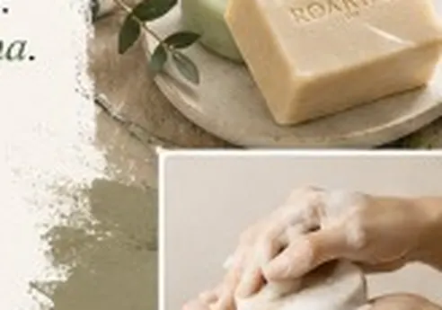 Mãos criando espuma com sabonete artesanal Roarina